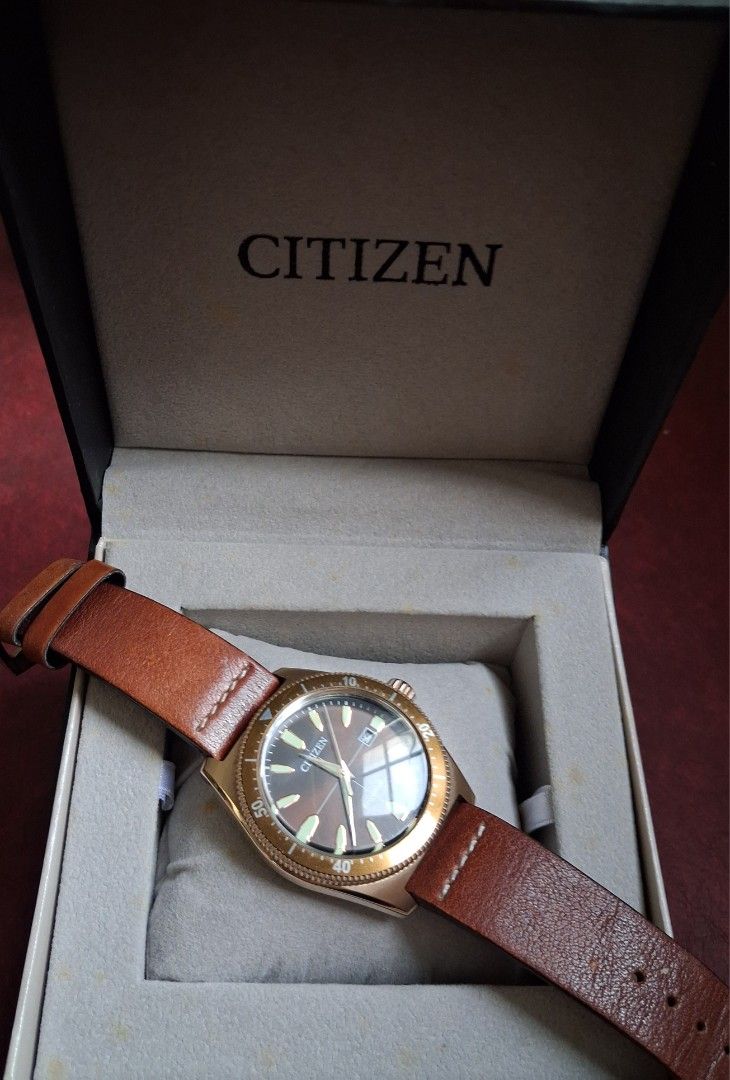 Citizen Eco-Drive AW1593-06X (Category: Men's Watches) located in Manila. Submitted by bernardo.isaac66 (Listing ID 1469975591, Image 3). Description: - Citizen Eco-Drive -Model AW1593-06X - Original and authentic - Complete set with box - Design: Stylish rose gold finish with a genuine brown leather strap - Functionality: Date display at 3 o'clock and rotating bezel with minute markers - Movement: Eco-Drive technology (powered by any light, no b