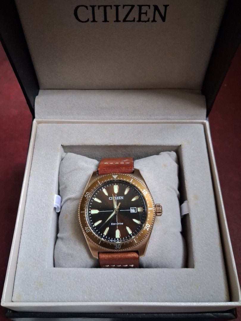 Citizen Eco-Drive AW1593-06X (Category: Men's Watches) located in Manila. Submitted by bernardo.isaac66 (Listing ID 1469975591, Image 1). Description: - Citizen Eco-Drive -Model AW1593-06X - Original and authentic - Complete set with box - Design: Stylish rose gold finish with a genuine brown leather strap - Functionality: Date display at 3 o'clock and rotating bezel with minute markers - Movement: Eco-Drive technology (powered by any light, no b
