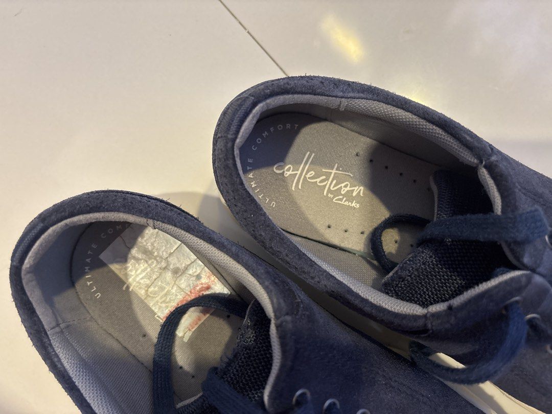 Clarks Collection Navy Blue Suede Sneakers (Category: Sneakers) located in Malaybalay. Submitted by trishmay (Listing ID 1469974044, Image 2). Description: - Brand/Model: Clarks Collection - Color: Navy blue with matching laces and white rubber soles - Material: Suede upper - Size: US 7.5 / UK 6.5 / EU 40 - Features: Ultimate comfort insoles, super cushioned for walking - Condition: Great everyday casual shoes with light wear on soles.