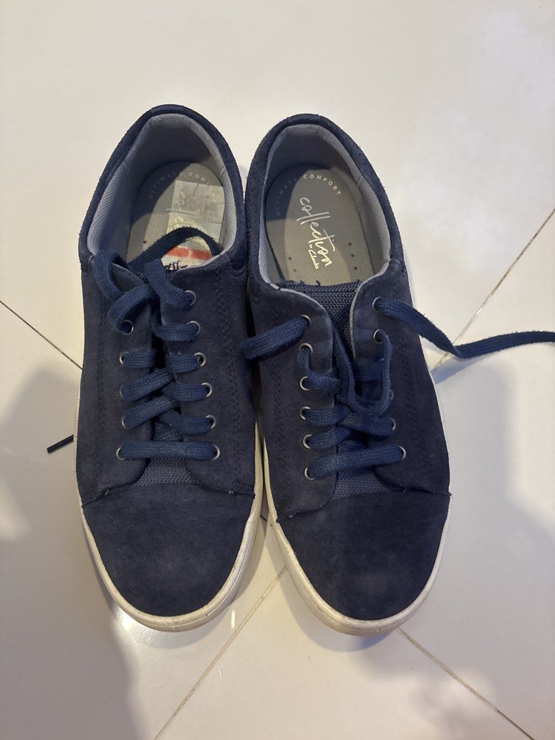 Clarks Collection Navy Blue Suede Sneakers (Category: Sneakers) located in Malaybalay. Submitted by trishmay (Listing ID 1469974044, Image 1). Description: - Brand/Model: Clarks Collection - Color: Navy blue with matching laces and white rubber soles - Material: Suede upper - Size: US 7.5 / UK 6.5 / EU 40 - Features: Ultimate comfort insoles, super cushioned for walking - Condition: Great everyday casual shoes with light wear on soles.