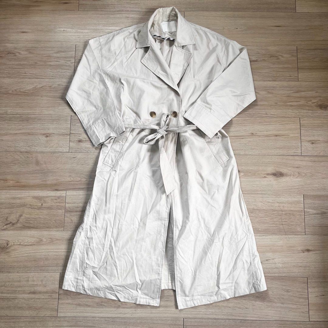 Classic Beige Long Trench Coat (Category: Coats, Jackets and Outerwear) located in Legazpi City. Submitted by hushedcry (Listing ID 1470113214, Image 1). Description: - Classic beige trench coat w/ tie belt - Perfect for layering over any outfit - Timeless and easy to style! <3 - just needs ironing 💌 mop: gcash/bank transfer 📬 shipping via j&t express (sf c/o buyer) for inquiries, dont hesitate to send me a msg! 🩷.