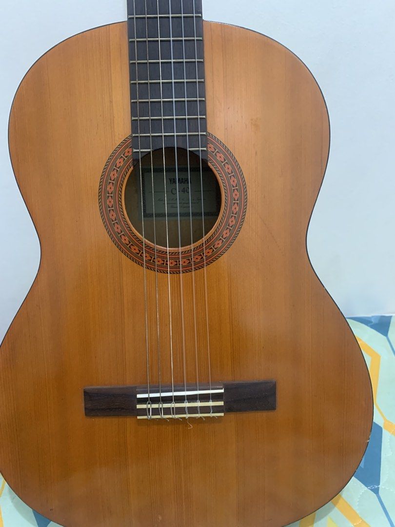 Classical Guitar (Category: Musical Instruments) located in Antipolo. Submitted by gmarte (Listing ID 1469959751, Image 3). Description: Yamaha C40 Made in Indonesia Newly replaced machine heads Savarez strings Comes w/ Ritter padded bag No repairs As Is Where Is Antipolo City Bgy San Roque No meet up Pick up or Shipping thru Lalamove or your choice No reservations 1st come 1st served 3.5K Last price Sale only no Swap.