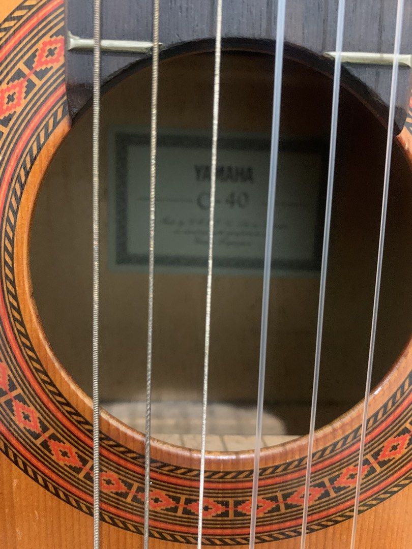 Classical Guitar (Category: Musical Instruments) located in Antipolo. Submitted by gmarte (Listing ID 1469959751, Image 2). Description: Yamaha C40 Made in Indonesia Newly replaced machine heads Savarez strings Comes w/ Ritter padded bag No repairs As Is Where Is Antipolo City Bgy San Roque No meet up Pick up or Shipping thru Lalamove or your choice No reservations 1st come 1st served 3.5K Last price Sale only no Swap.