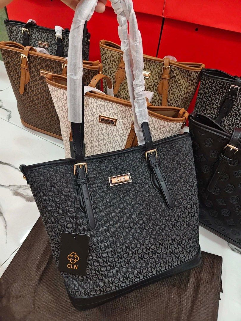 CLN Monogram Tote Bag Black (Category: Tote Bags) located in Manila. Submitted by zosia_smith (Listing ID 1470011217, Image 3). Description: - Brand: CLN - Color: Classic Black - Design: All-over debossed monogram pattern - Hardware: Gold-tone hardware with protective metal feet at the base - Straps: Dual shoulder straps (wrapped in protective paper) - Closure: Secure zip top closure - Interior: Lined with a convenient zippered pocket and CLN bra