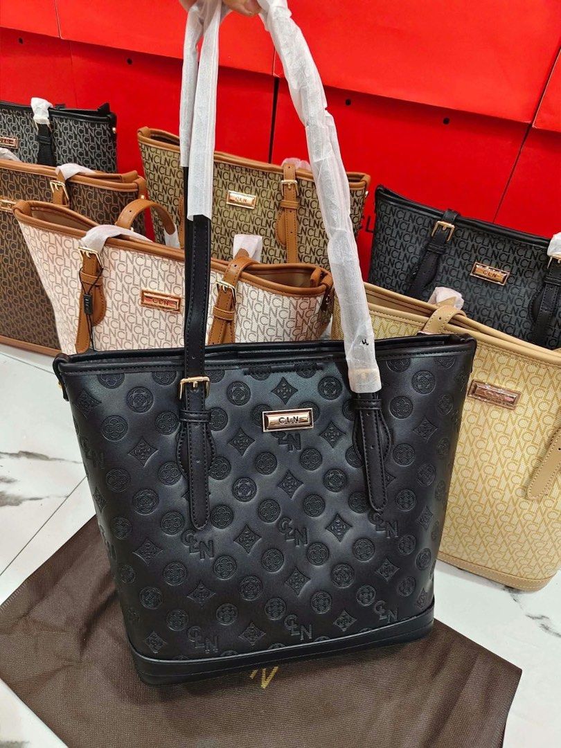 CLN Monogram Tote Bag Black (Category: Tote Bags) located in Manila. Submitted by zosia_smith (Listing ID 1470011217, Image 1). Description: - Brand: CLN - Color: Classic Black - Design: All-over debossed monogram pattern - Hardware: Gold-tone hardware with protective metal feet at the base - Straps: Dual shoulder straps (wrapped in protective paper) - Closure: Secure zip top closure - Interior: Lined with a convenient zippered pocket and CLN bra