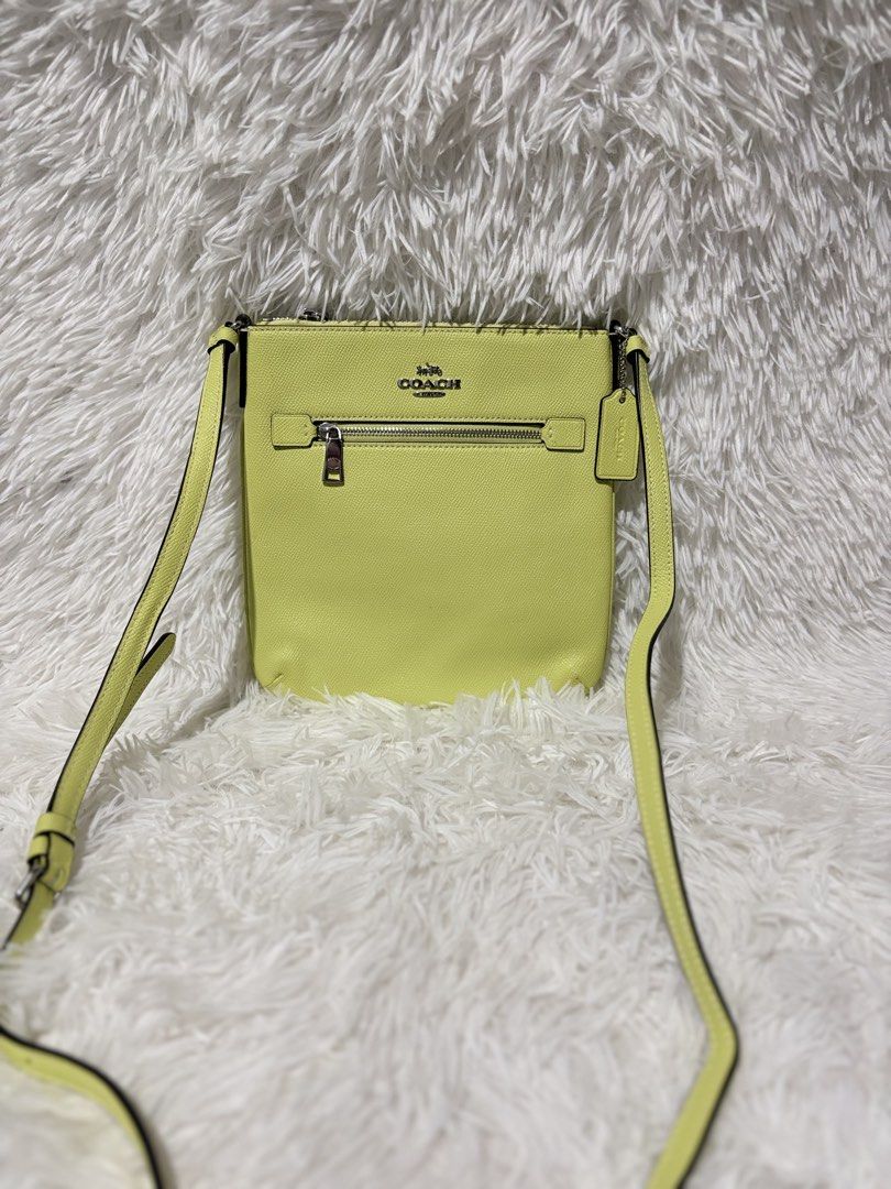 Coach (Category: Luxury Bags & Wallets) located in Baguio. Submitted by rheaanne07 (Listing ID 1470076728, Image 3). Description: Coach Mini Rowan File Bag in the Pale Lime Like new kulang nalang ng inclusions Wala na akong masabi 😉 Orig.