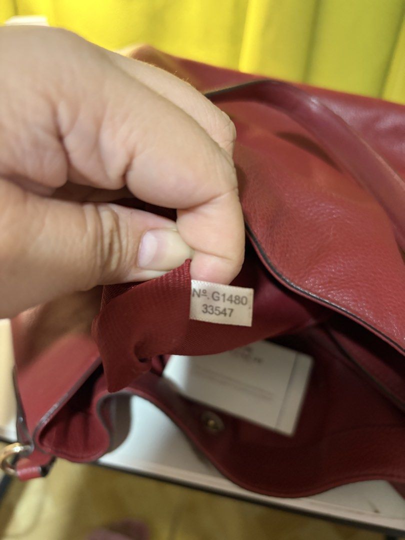 Coach Edie Shoulder Bag (Category: Shoulder Bags) located in Borongan. Submitted by charmspreloveddd (Listing ID 1470022060, Image 2). Description: - Authentic Coach red pebble leather shoulder bag - Style Number: 33547 - Elegant gold-tone hardware and iconic oval Coach New York logo plaque - Dual top handles and secure top zip closure - Spacious interior lined in red fabric with functional zip and slip pockets - L:35cm (bottom) 23cm (top) W:14cm