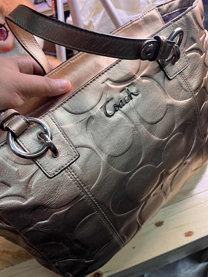 Coach gold handbag (Category: Shoulder Bags) located in Cagayan de Oro. Submitted by prelovedukayukaybags_cdo (Listing ID 1470021270, Image 3). Description: .