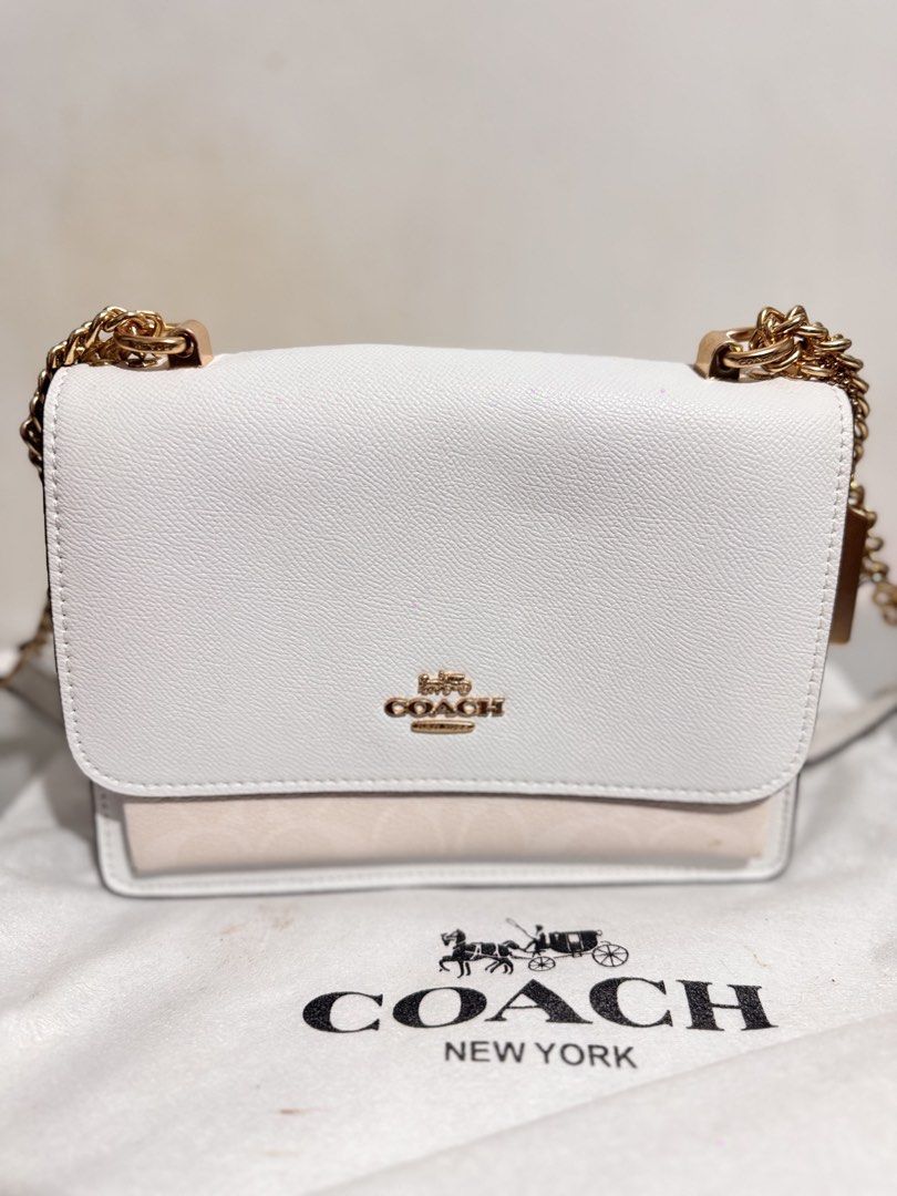 Coach Klare White Chain Crossbody Bag (Category: Luxury Bags & Wallets) located in Mabalacat. Submitted by kay_miscak (Listing ID 1470094020, Image 1). Description: - Coach crossbody bag in pristine condition - Crafted from durable white crossgrain leather with elegant gold hardware - Stylish chain and leather combination strap - Structured accordion design with multiple interior compartments for easy organization - Clean exterior and interior - 