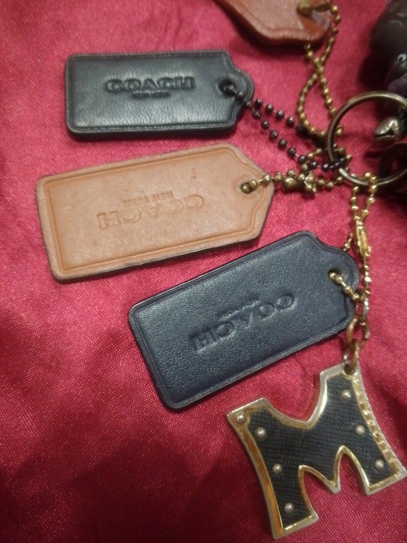 Coach Leather Bag Charm Tags (Category: Charms) located in Manila. Submitted by annemil_1984 (Listing ID 1469823571, Image 2). Description: coach,mk,Kipling,metro hangtag 150 each for coach hangtag 200 each Kipling monkey 100mk hangtag msg for taking all Charms mas malaking discount.