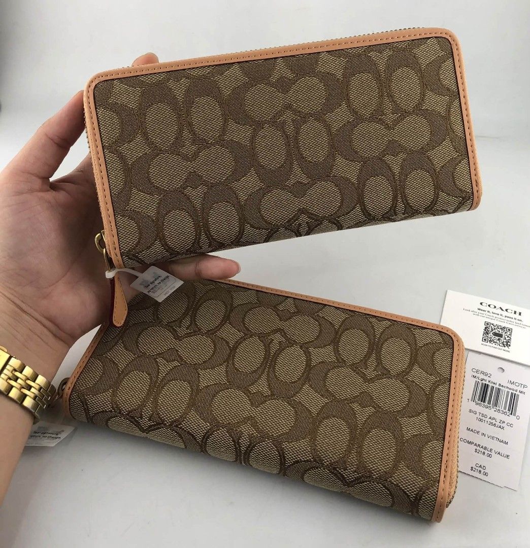Coach Long Wallet in Signature Canvas (Category: Wallets & Card holders) located in Quezon City. Submitted by bagsboutiqueph (Listing ID 1470067286, Image 1). Description: LAST PRICE POSTED. LIMITED STOCKS! BRANDNEW WITH INCLUSIONS. COLOR MAY SLIGHTLY VARY IN ACTUAL DUE TO LIGHTING AND CAMERA SETTING. OTHER PHOTOS WILL BE SEND DURING PURCHASE AND FOR SURE BUYERS ONLY. WHEN IN DOUBT, DO NOT ORDER. THANK YOU..