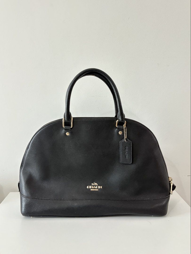 Coach Sierra Satchel (Category: Cross-body Bags) located in Davao. Submitted by air3cl (Listing ID 1470002731, Image 2). Description: Authentic Coach Crossgrain Leather Sierra Satchel - obvious signs of use - chipping around the handles of the bag - clean lining - chipping/peeling of the Coach label/tag inside.