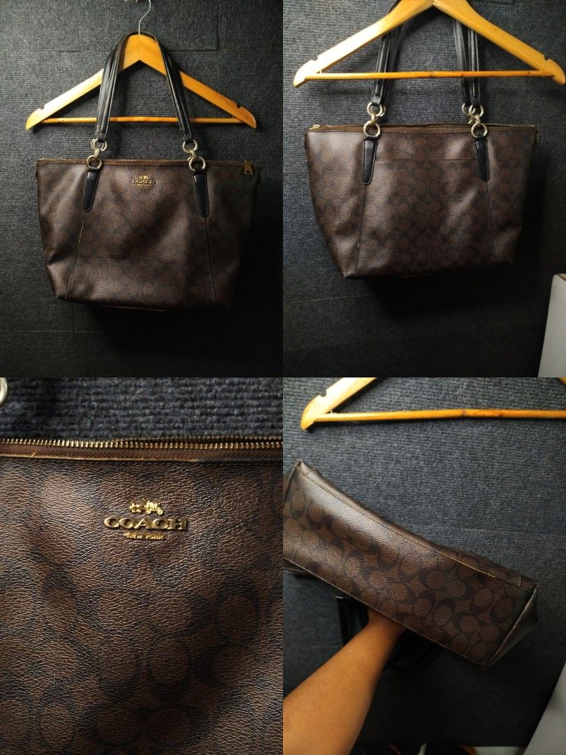 Coach Signature Brown Monogram Tote Bag (Category: Luxury Bags & Wallets) located in Manila. Submitted by luckyfire-b12a (Listing ID 1469998492, Image 1). Description: Coach signature monogram tote bag in dark brown. Classic coated canvas exterior with black leather straps and gold tone hardware. Zip top closure. Inside has fabric lining, one zip pocket, and slip pockets. Interior shows some dust and wear. Strap edges and bottom corners show visi