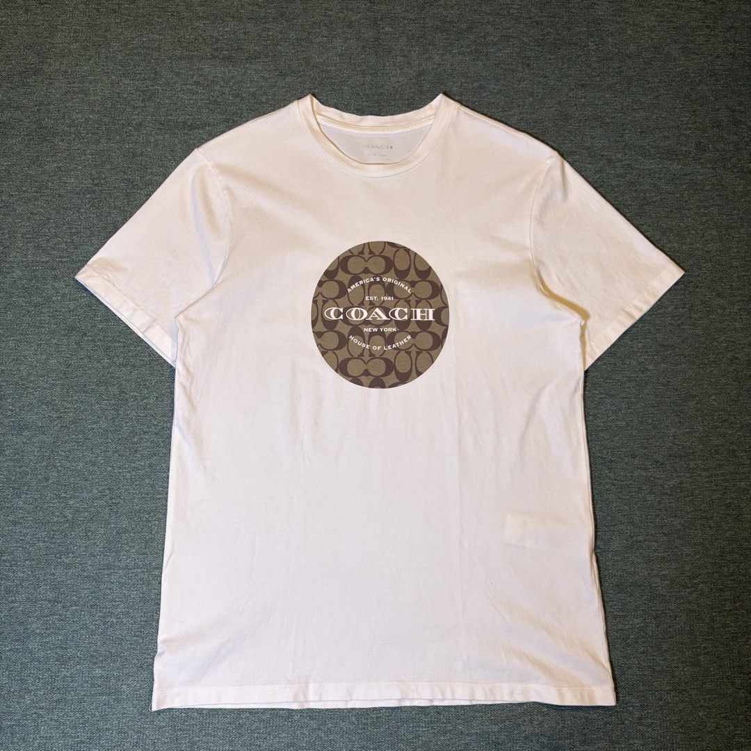 Coach Signature C Tee (Category: Tshirts & Polo Shirts ) located in Butuan. Submitted by ragscurations (Listing ID 1470049713, Image 1). Description: Size : Medium Inches : Width 19 Inches : Length 27 Condition : Excellent Flaws : Flawless Color rate 9.5 Fave item : Beautiful design.