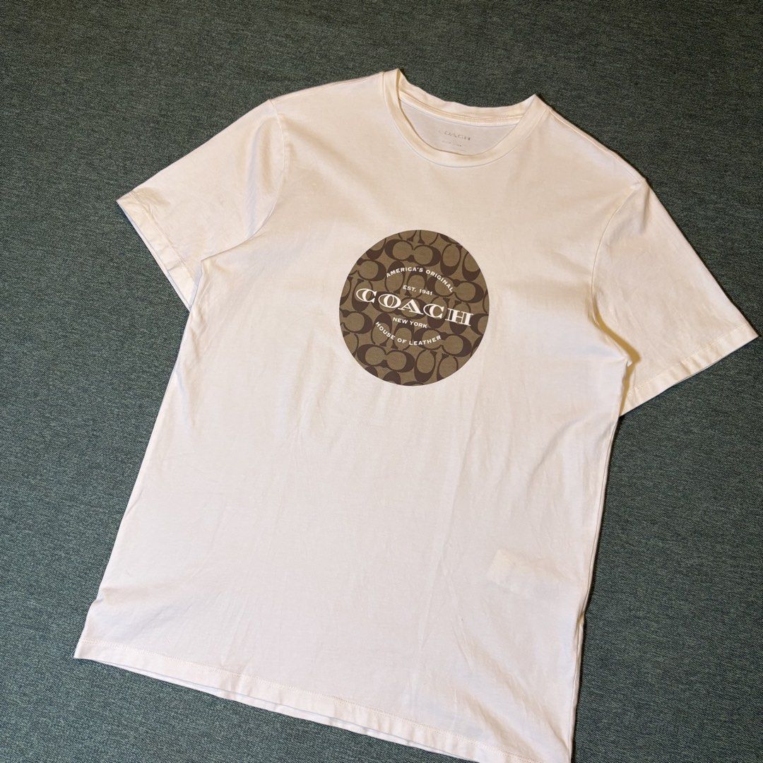 Coach Signature C Tee (Category: Tshirts & Polo Shirts ) located in Butuan. Submitted by ragscurations (Listing ID 1470049713, Image 2). Description: Size : Medium Inches : Width 19 Inches : Length 27 Condition : Excellent Flaws : Flawless Color rate 9.5 Fave item : Beautiful design.