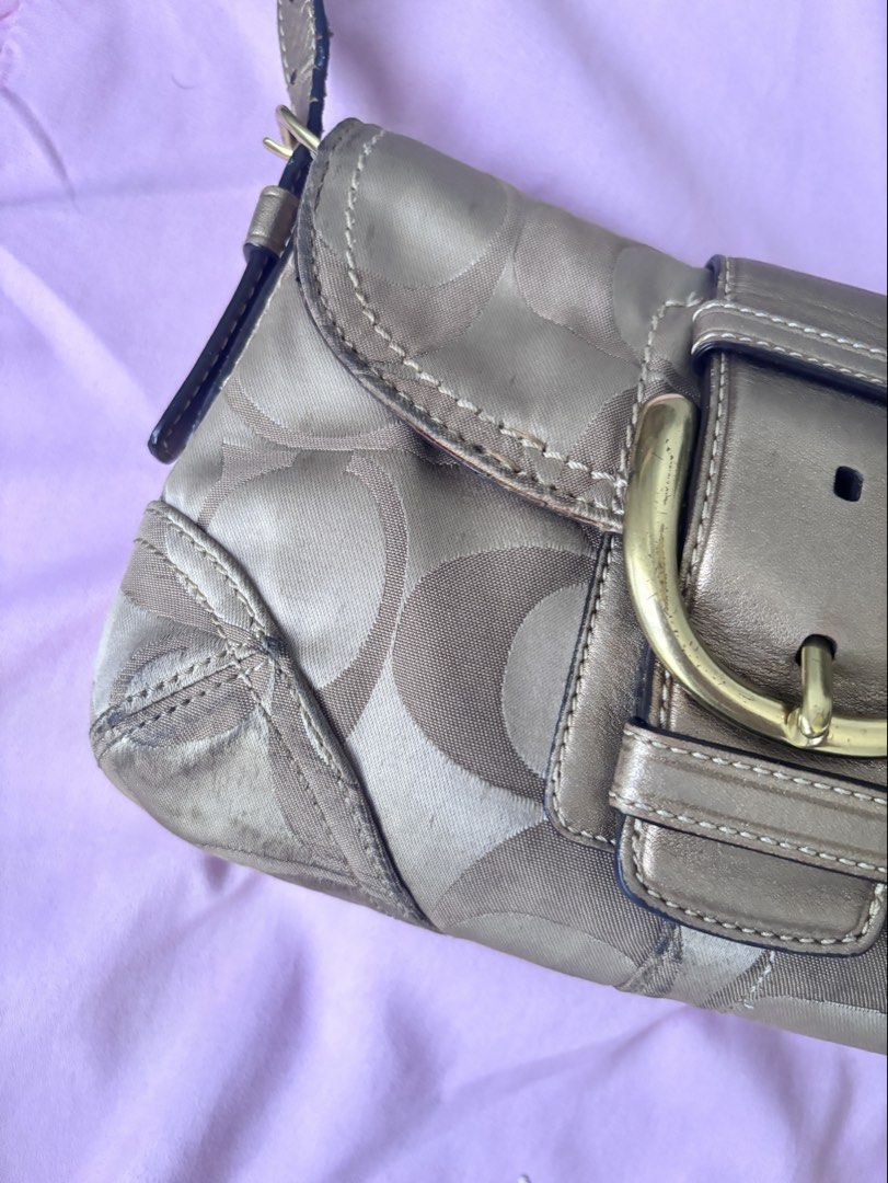 Coach Soho Sateen Bag (Category: Shoulder Bags) located in Manila. Submitted by andreakhyl96722 (Listing ID 1469971102, Image 3). Description: with minimal signs of usage on the strap fadings on the handle and minimal cracks on the rubber lining colors may vary due to lighting condition: 7/10 💌 for more pics price is still nego! rfs: not my style loc: san juan city .