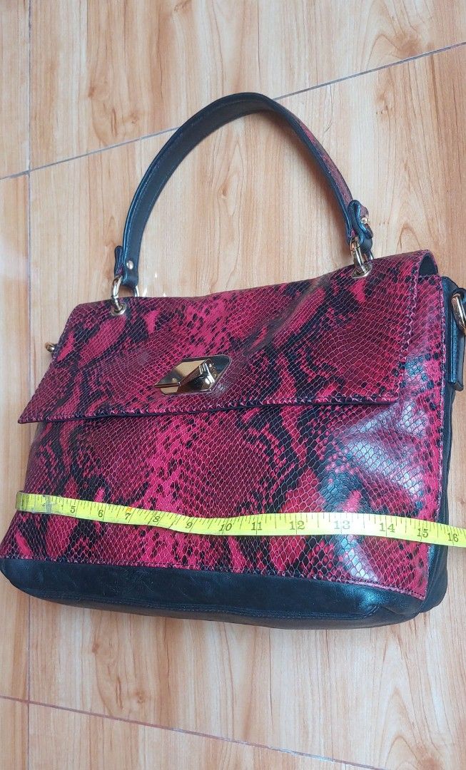 Coccinelle Red Snakeskin Pattern Shoulder Bag (Category: Luxury Bags & Wallets) located in Davao. Submitted by wengbagstuff (Listing ID 1470114837, Image 2). Description: 🍀 light signs of usage 🍀 lambskin leather, no issues 🍀 missing sling but with provision for sling...but nicer as kili bag when worn..