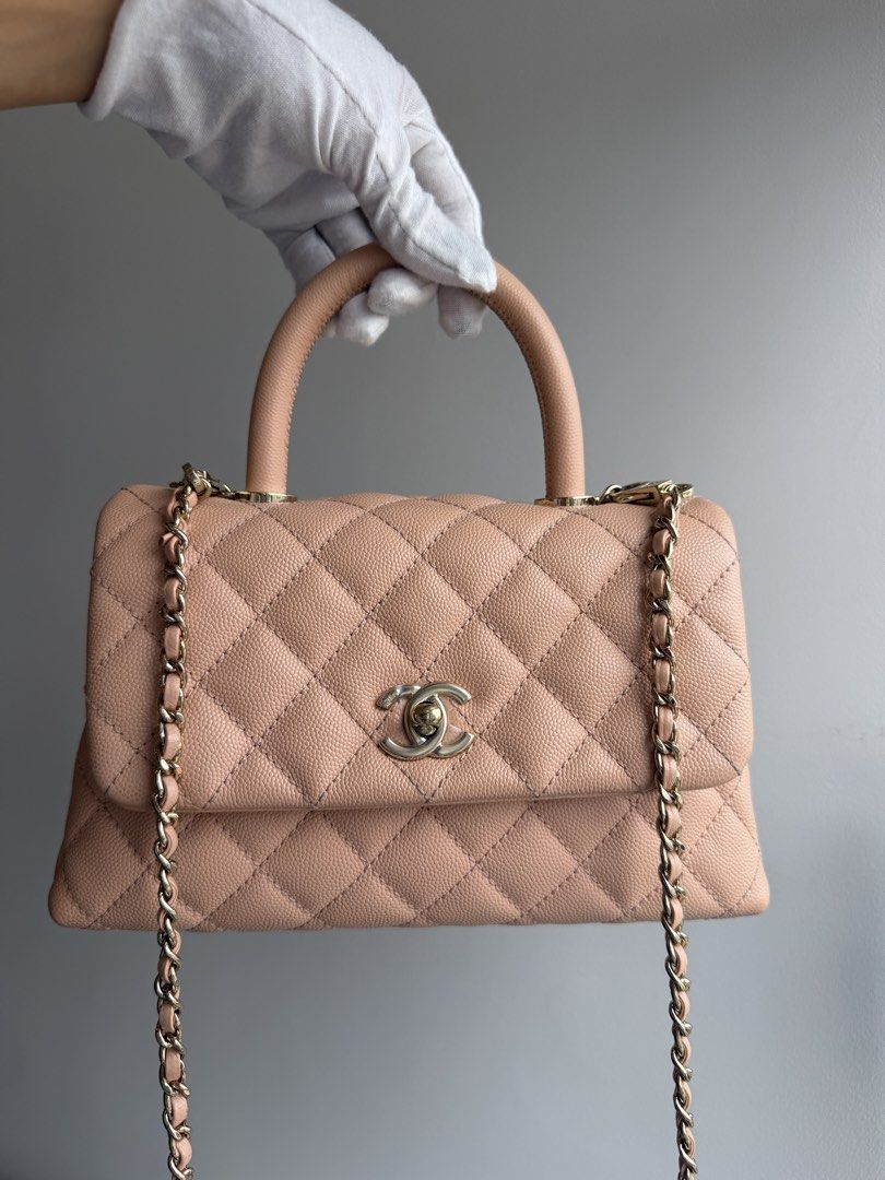 COCO TOP HANDLE SMALL (Category: Luxury Bags & Wallets) located in Makati City. Submitted by theladyluxe.ph (Listing ID 1469948209, Image 2). Description: ✨ CHANEL COCO TOP HANDLE ROSE CLAIR ✨ Small GHW Caviar leather Series 31 RANK A+ Complete set no receipt w/ FREE certificate of authenticity Store Price 370k+ 🏷️ 280k only for 3 mo layaway Nego for cash 💳 MOP: BPI/Bank Transfer/Gcash/Maya/Paypal DISCLAIMER: theladyluxxe is NOT AFFILIATED with