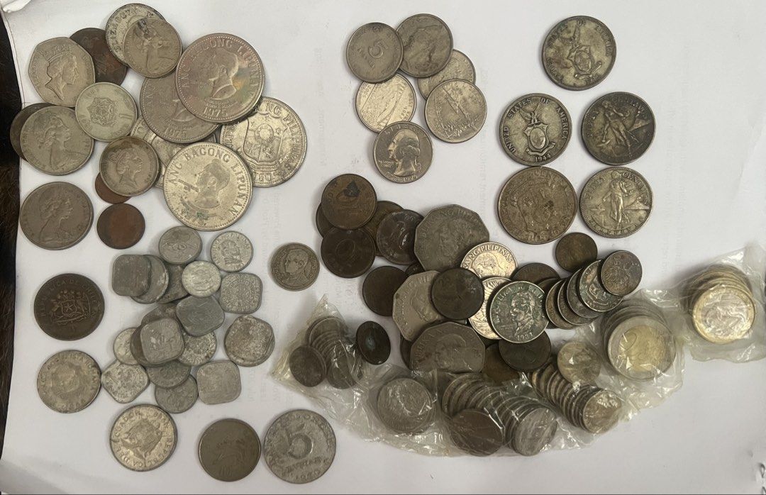 Collector’s coin (Category: Announcements) located in Manila. Submitted by tesmultimarcasempire (Listing ID 1470036948, Image 1). Description: 🪙 Vintage Coin Collection — For Sale! ✨ What You’re Getting A nice mix of vintage different country coins from the 1970s–1990s era — includes: • ₱1 Piso (Ang Bagong Lipunan / Republika ng Pilipinas) • 5 Sentimo, 10 Sentimo, 25 Sentimo — various years & designs • Some larger commemorative & older coins too