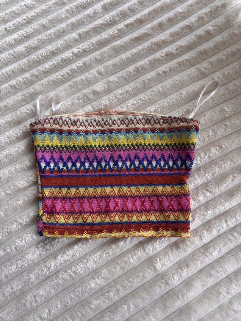 Colorful Knit Boho Pattern Tube Top Strapless Crop Top (Category: Sleeveless) located in Manila. Submitted by bellebeauty.2002 (Listing ID 1470008769, Image 2). Description: Vibrant multi-colored knitted tube top with geometric patterns in pink, yellow, blue, and red. Features a fitted strapless design with optional thin white straps. Perfect for warm weather or layering.