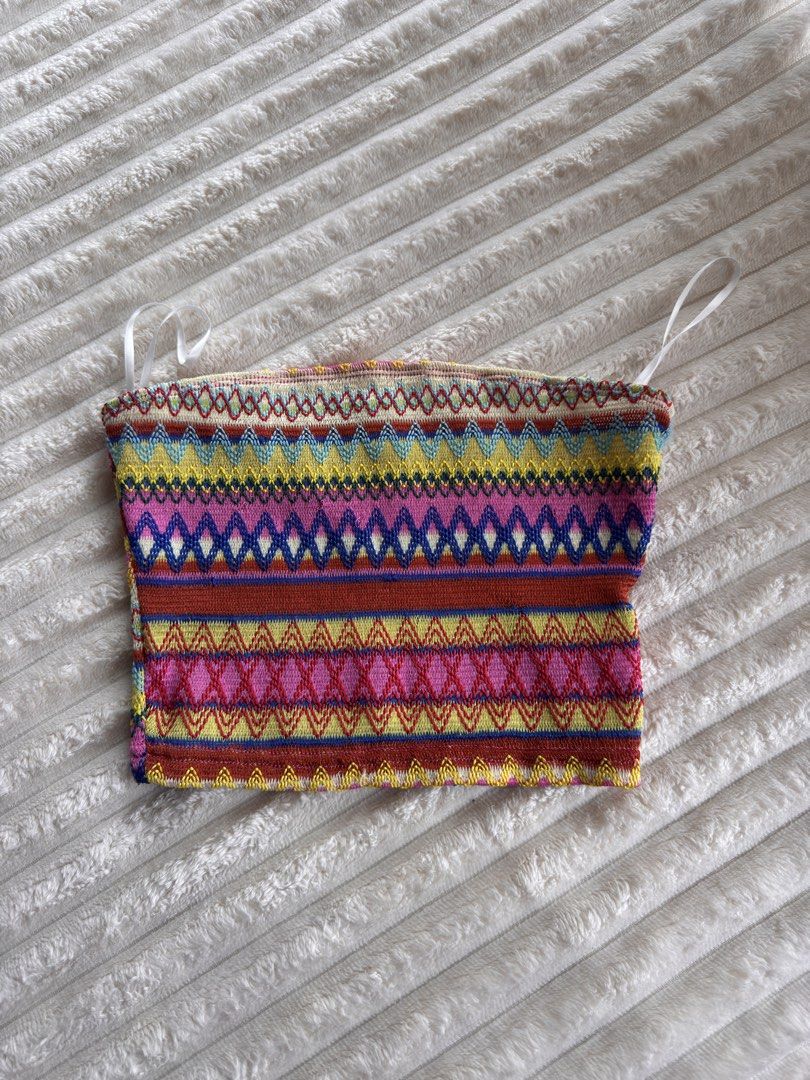 Colorful Knit Boho Pattern Tube Top Strapless Crop Top (Category: Sleeveless) located in Manila. Submitted by bellebeauty.2002 (Listing ID 1470008769, Image 1). Description: Vibrant multi-colored knitted tube top with geometric patterns in pink, yellow, blue, and red. Features a fitted strapless design with optional thin white straps. Perfect for warm weather or layering.