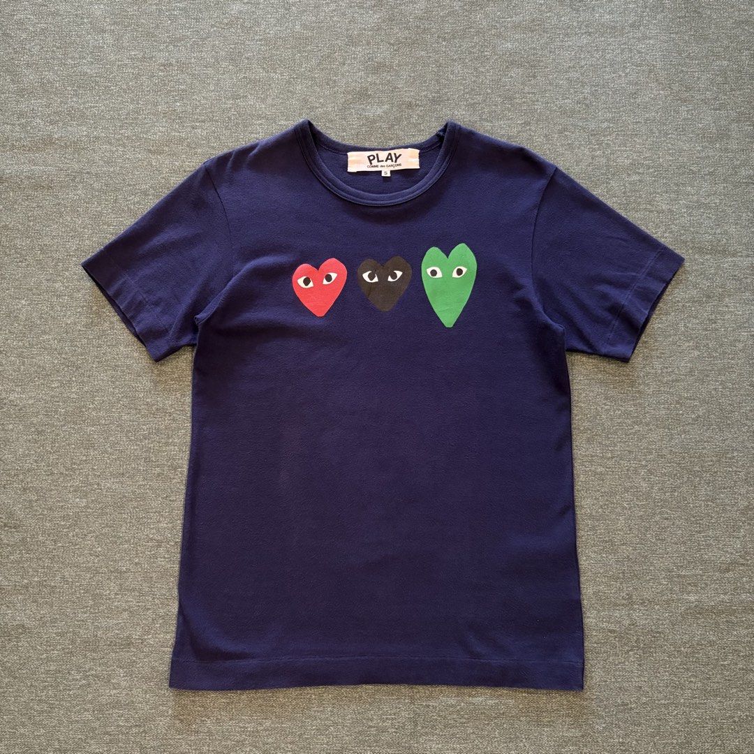 Comme Des Garcons Multiple Hearts (Category: Tshirts & Polo Shirts ) located in Butuan. Submitted by ragscurations (Listing ID 1469966137, Image 1). Description: Size : S-M Inches : Width 18 Inches : Width 25.5 Condition : Excellent Flaws : None Color rate 9.2 Fave item : Beautiful design.