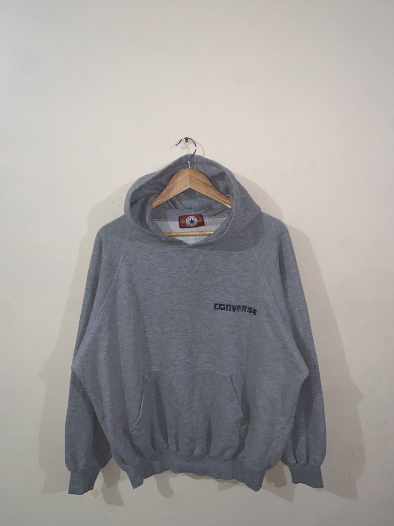 Converse All Star Hoodie Grey Pullover (Category: Hoodies) located in Manila. Submitted by bud_thriftt (Listing ID 1469964089, Image 1). Description: - Authentic grey Converse hoodie - Classic embroidered logo on the chest - Cozy pullover design with long sleeves and front pocket - Ribbed cuffs and hem for a snug fit - Soft, comfortable material ideal for casual days - Easy to style and versatile.