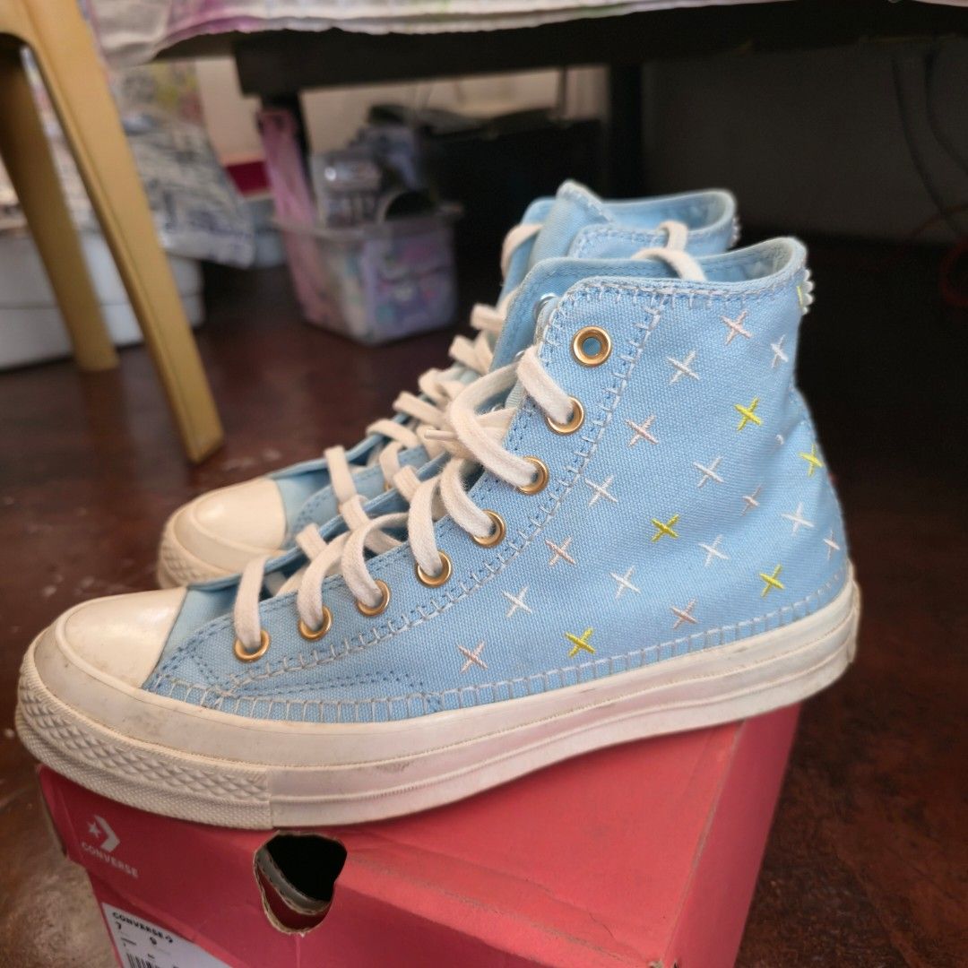 Converse Chuck 70 HI Crafted Stitching Light Blue (Category: Sneakers) located in Dumaguete. Submitted by terrificraft (Listing ID 1469963395, Image 2). Description: - Brand: Converse Chuck Taylor All Star 70 High Top - Model: A09838C - Occasion: lifestyle - Fit: Unisex - Series: Chuck 70 - Color: Light blue canvas with gold eyelets and white laces - Special Feature: Charming embroidered details on sides with white flower on heels - Condition: Li