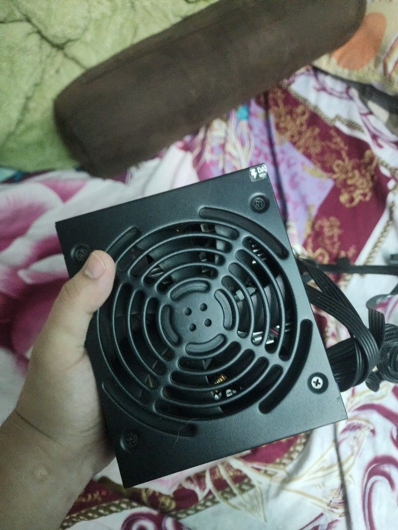 Corsair CV450 Power Supply Unit (Category: Computer Parts) located in Taguig. Submitted by moseslopez97175 (Listing ID 1470128752, Image 1). Description: - Brand: Corsair Model: CV450 - Power Output: 450 Watts - Form Factor: Standard ATX - Color: Black casing with attached black cables (includes PCIe and CPU connectors) - Condition: Clean unit, pulled from a working desktop setup, legible specification sticker RFS: Upgraded my PSU .