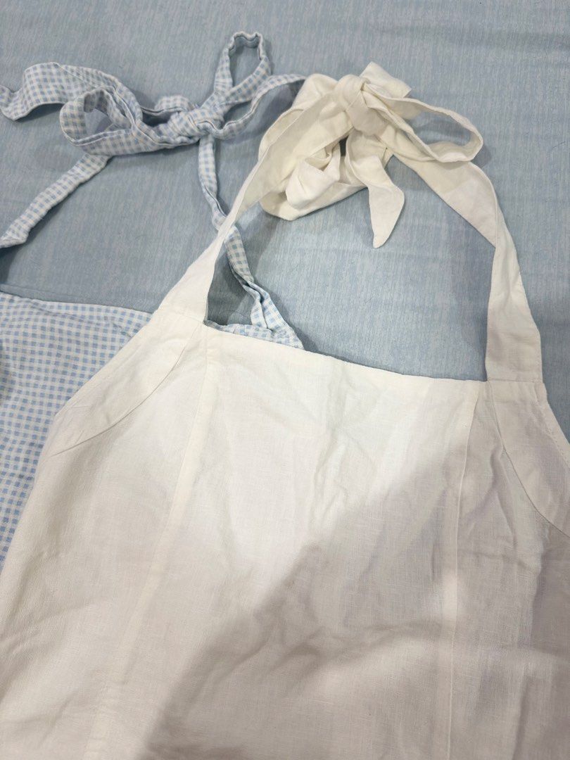 Cotton On Tie-Shoulder Halter Tops Set (2 pcs) (Category: Sleeveless) located in Manila. Submitted by buymiclothes.47 (Listing ID 1470107438, Image 2). Description: Cotton On Tie-Shoulder Halter Tops Bundle (2 pcs) | Size AU 10 Selling these two cute Cotton On tops as a set! 🩵🤍 Includes: * 1 Blue & white gingham/checkered top * 1 Plain white/cream top Details: * Brand: Cotton On * Both size AU 10 / US 6 / EU 38 * Adjustable tie straps with bow 