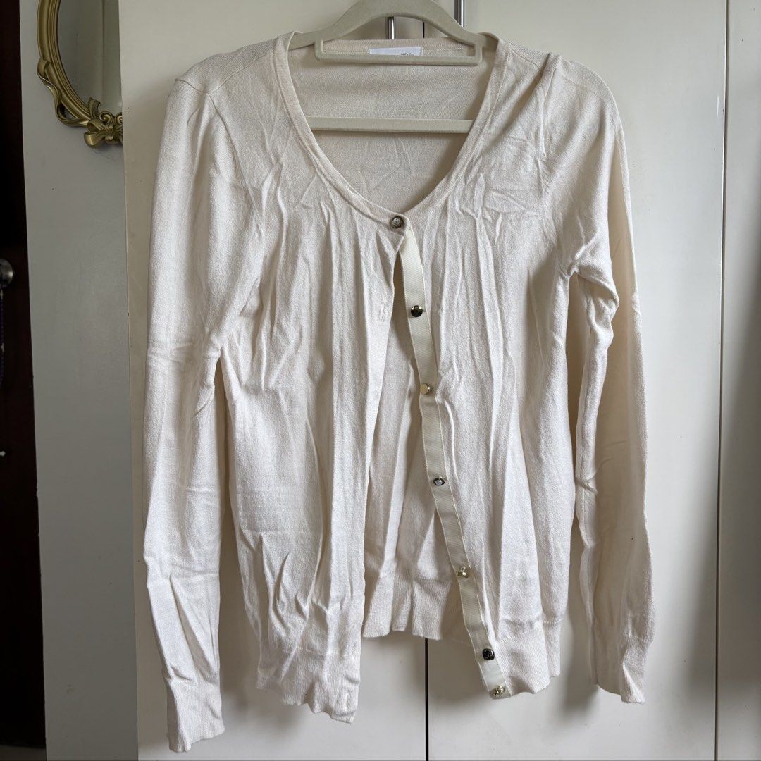 cream cardigan (Category: Coats, Jackets and Outerwear) located in Manila. Submitted by lavieelle (Listing ID 1469979781, Image 1). Description: - branded cardigan bought in states - best fit xs to small frames - complete buttons, no flaws - rfs: decluttering .