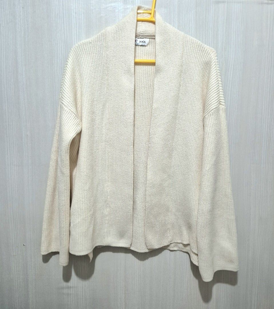 Cream Ribbed Knit Open Cardigan (Category: Coats, Jackets and Outerwear) located in San Mateo. Submitted by sellbypelle (Listing ID 1470019997, Image 2). Description: Pre loved 🌸 Brand: Yika Korea Actual Measurements W: 22 (44 bust) can stretch up to 46 L : 24 inch No Issue Location: Rizal 💰 Payment: GCash — pay first 📦 Shipping: + sf via J&T only 🗓️ Batch shipping: Once a week 💡 Actual color may vary slightly due to lighting and screen sett