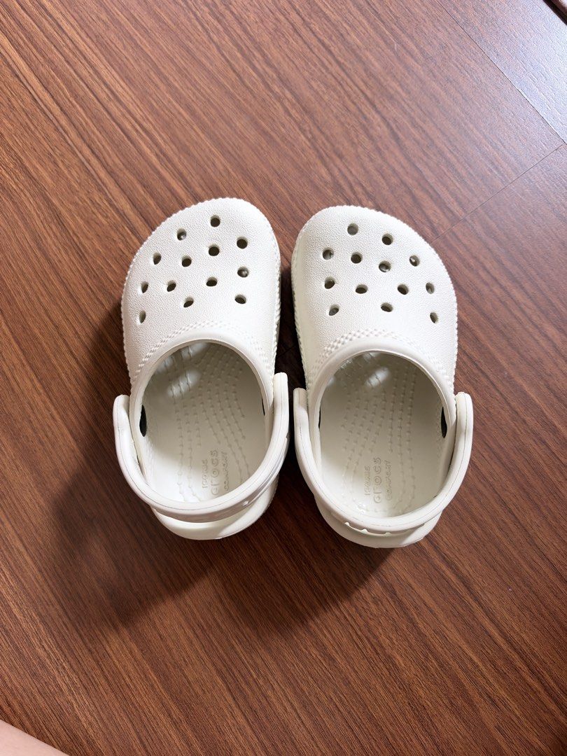 Crocs Kids Clogs Bone Off-White Size C5 (Category: Babies & Kids Fashion) located in Taguig. Submitted by seliinacruz (Listing ID 1469956129, Image 1). Description: Used for 1 month only.