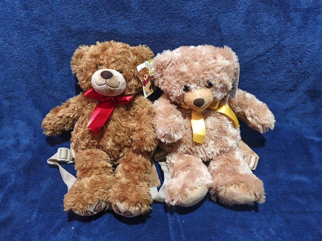 Cute Teddy Bear Backpack Plush Bag Set (2 Colors) (Category: Plushies & Soft Toys) located in Manila. Submitted by kirstentoyshub (Listing ID 1470016248, Image 1). Description: - Brand new plush teddy bear backpacks with tags still attached - Available in 2 cute designs: Dark Brown with Red Ribbon or Light Brown with Yellow Ribbon - Made with ultra-soft and fluffy material all over - Features a functional zippered backpack compartment on the back