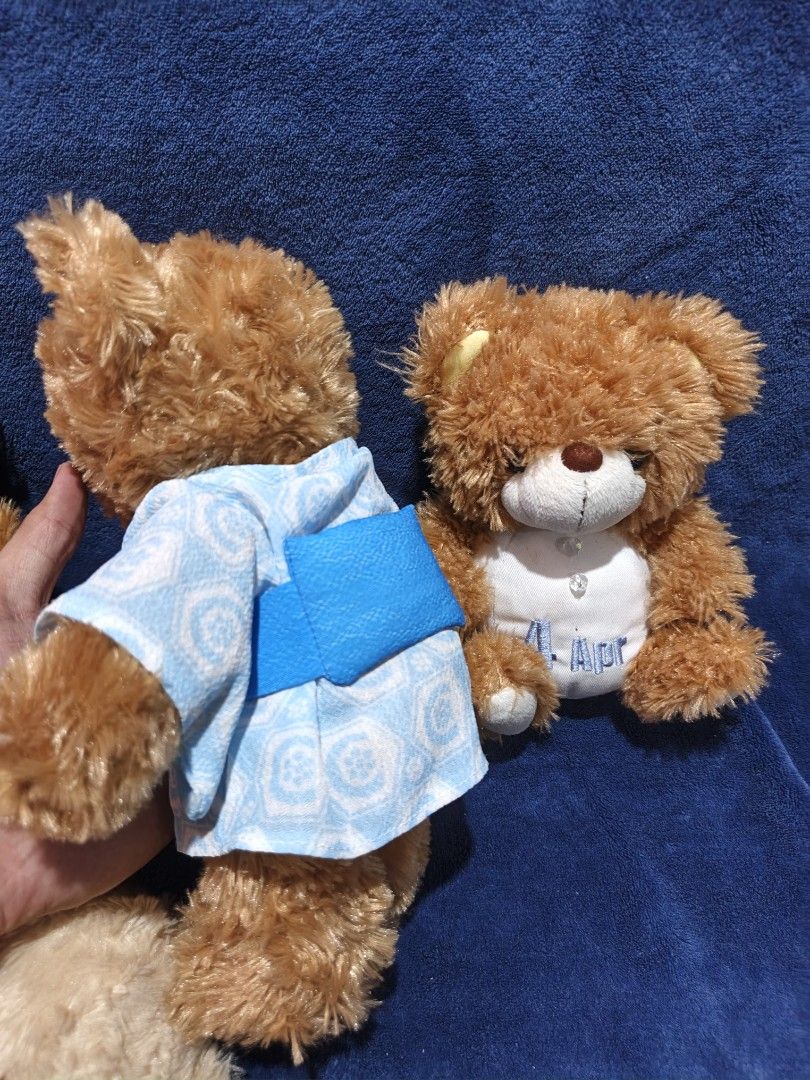Cute Teddy Bear Plush Toy Bundle Set (Category: Plushies & Soft Toys) located in Manila. Submitted by kirstentoyshub (Listing ID 1470016334, Image 3). Description: - Set of 4 unique, soft-fur teddy bears - Features: Japanese blue yukata robe, '4 Apr' embroidered shirt with gems, red ribbon bow, and brown/red ribbon - Material: Ultra-soft plush fur - Perfect addition for stuffed toy collectors and gift-giving - Condition: Brand new / Excellent.