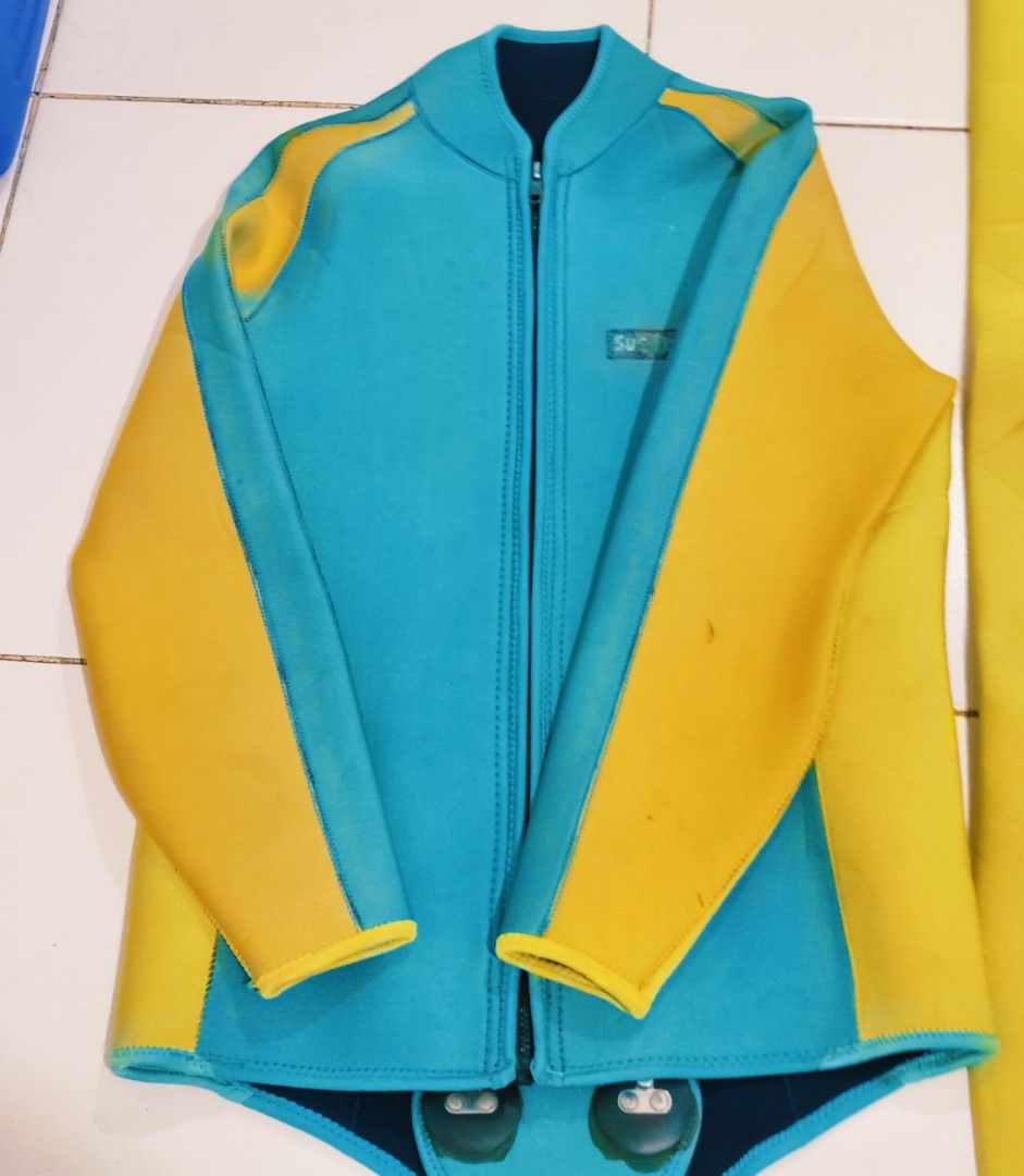 Cyan and yellow diving wetsuit jacket with front zipper (Category: Coats, Jackets and Outerwear) located in Bulacan. Submitted by babz30261 (Listing ID 1470085594, Image 1). Description: - Color: Vibrant cyan and yellow - Closure: Full front zipper - Design: Long sleeves with yellow accents and a stand-up collar - Material: Durable neoprene - Ideal for: Surfing, diving, and other water sports - Condition: Brand new / Excellent quality.