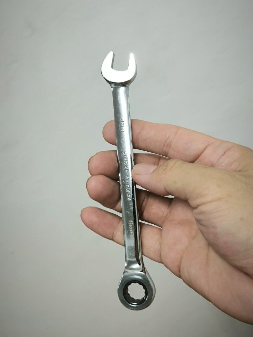 Daiso 11mm Chrome Vanadium Combination Ratchet Wrench (Category: Home Improvement Tools & Accessories) located in Angeles City. Submitted by yellowbrickstore (Listing ID 1470117343, Image 1). Description: - Brand: Daiso - Size: 11mm combination ratchet wrench - Material: Durable chrome vanadium steel with polished silver finish - Design: Open end on one side, 12-point ratcheting ring end on the other - Ideal for: Quick DIY fixes and bike maintena