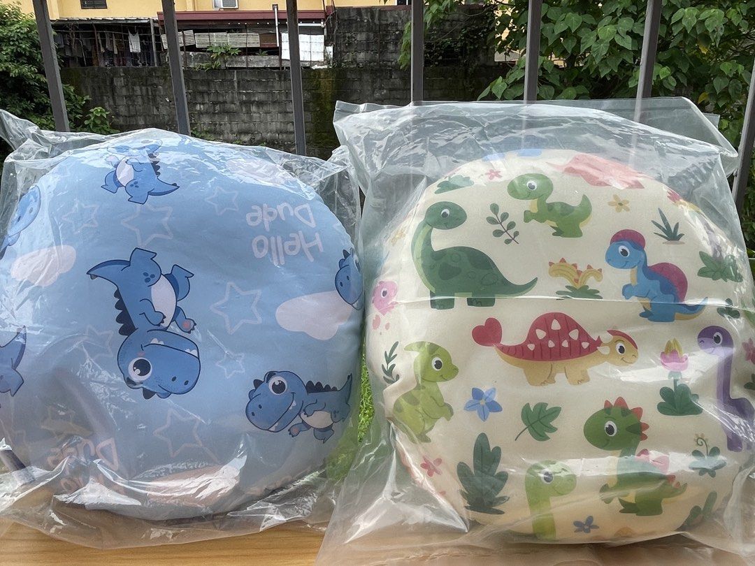 Dakki Pillow (Category: Children's Beds) located in Binangonan. Submitted by shianloves33961 (Listing ID 1470060281, Image 1). Description: - Fun and colorful dinosaur print design - Round shaped, perfect for kids room or nursery - Soft and comfortable material to lean on - Brand new and still sealed in original plastic wrapper - Clean and ready to use.
