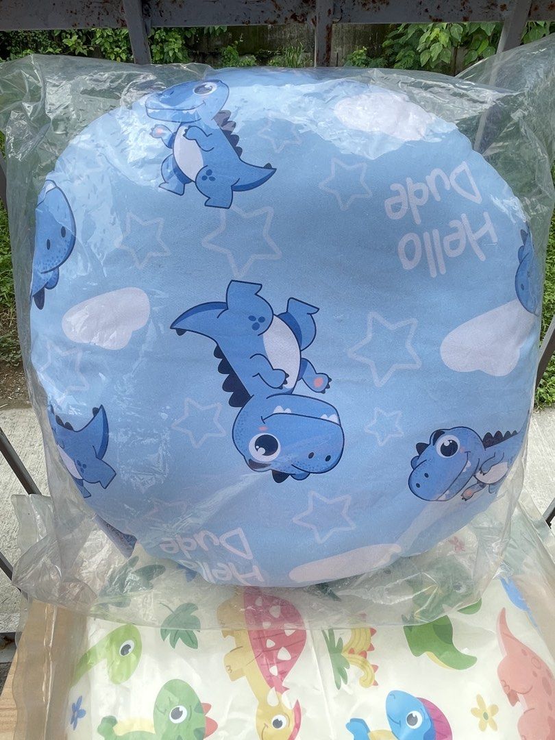Dakki Pillow (Category: Children's Beds) located in Binangonan. Submitted by shianloves33961 (Listing ID 1470060281, Image 3). Description: - Fun and colorful dinosaur print design - Round shaped, perfect for kids room or nursery - Soft and comfortable material to lean on - Brand new and still sealed in original plastic wrapper - Clean and ready to use.