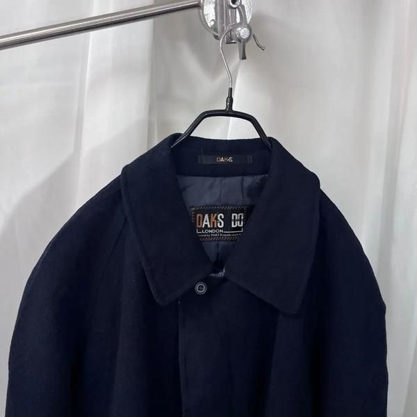 DAKS Coat (Category: Coats, Jackets and Outerwear) located in Singapore. Submitted by bunjangpartners (Listing ID 1470103498, Image 5). Description: DAKS Coat Size: Marked as M Condition: Clean with slight signs of use [Detailed Size] Shoulder + Arm: 75cm Total Length: 88cm Chest: 60cm Shipping fee 3,000 KRW (6,000 KRW for Jeju/Remote Mountainous Areas) --[Before You Buy]-- Sourced from Bunjang, Korea's leading recommerce platform through our pur