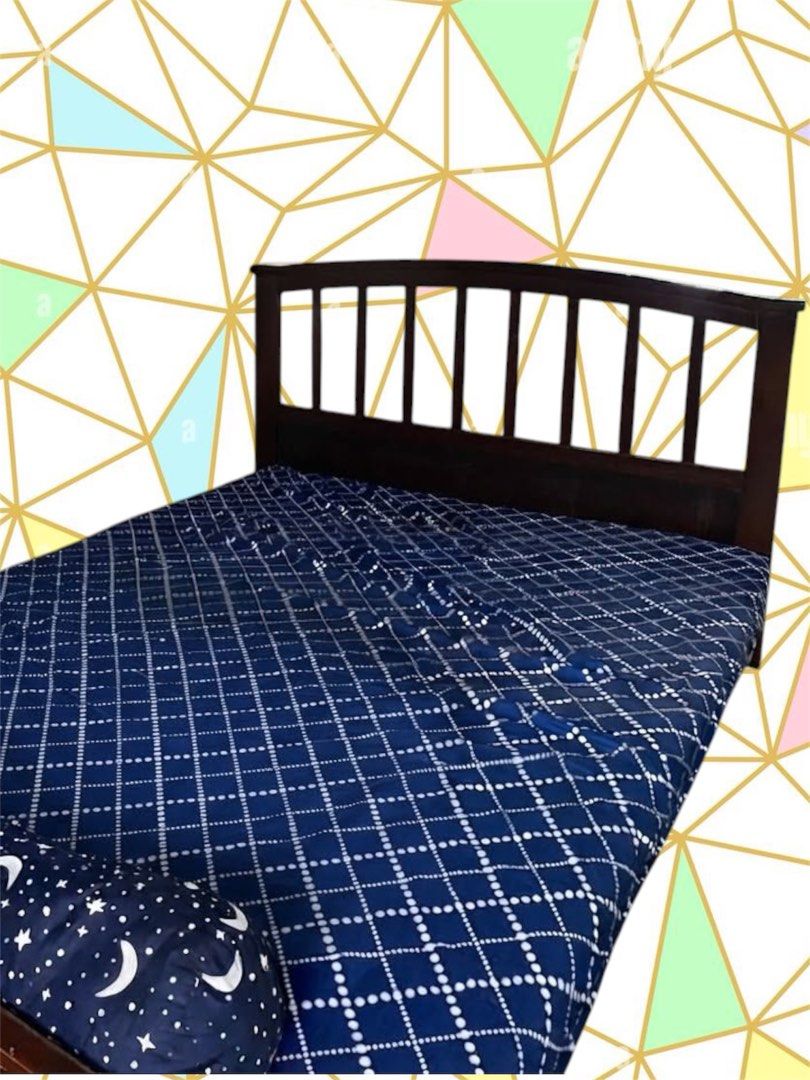 Dark brown wooden bed frame with bed mattress (Category: Bed Frames & Mattresses) located in Quezon City. Submitted by flrsgela (Listing ID 1470097472, Image 2). Description: - dark wood bed frame - Classic headboard with vertical slats - Ready for a new home - Bedsheet not included - Slightly negotiable - Double size bed.