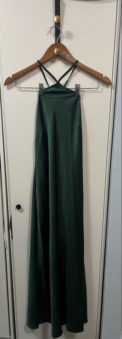 Dark Green Halter Neck Maxi Dress (Category: Dresses) located in Manila. Submitted by bonita1209 (Listing ID 1469987062, Image 1). Description: ✨ DRESS FOR SALE / FOR RENT ✨ 💕 Worn only once for a wedding! Color: Dark green Material: Smooth, lightweight satin that drapes beautifully Design: Halter neck with crisscross front straps, adjustable back tie, and sexy open back Length: Full length / maxi Occasion: Ideal for parties, weddings, and forma