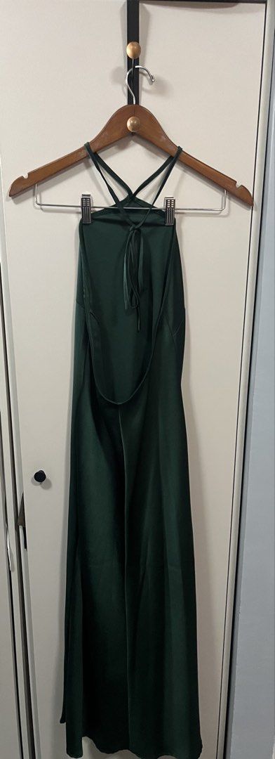 Dark Green Halter Neck Maxi Dress (Category: Dresses) located in Manila. Submitted by bonita1209 (Listing ID 1469987062, Image 2). Description: ✨ DRESS FOR SALE / FOR RENT ✨ 💕 Worn only once for a wedding! Color: Dark green Material: Smooth, lightweight satin that drapes beautifully Design: Halter neck with crisscross front straps, adjustable back tie, and sexy open back Length: Full length / maxi Occasion: Ideal for parties, weddings, and forma