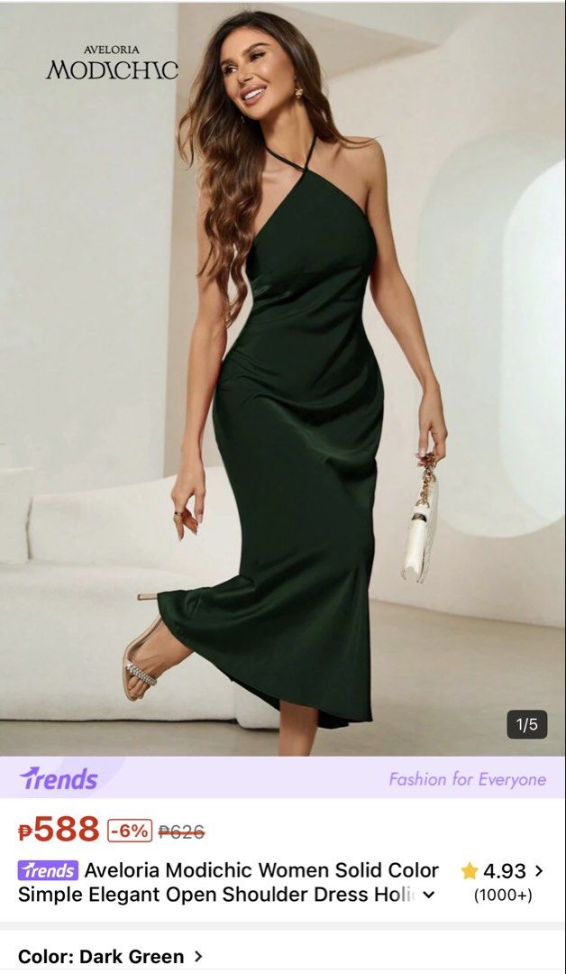Dark Green Halter Neck Maxi Dress (Category: Dresses) located in Manila. Submitted by bonita1209 (Listing ID 1469987062, Image 3). Description: ✨ DRESS FOR SALE / FOR RENT ✨ 💕 Worn only once for a wedding! Color: Dark green Material: Smooth, lightweight satin that drapes beautifully Design: Halter neck with crisscross front straps, adjustable back tie, and sexy open back Length: Full length / maxi Occasion: Ideal for parties, weddings, and forma