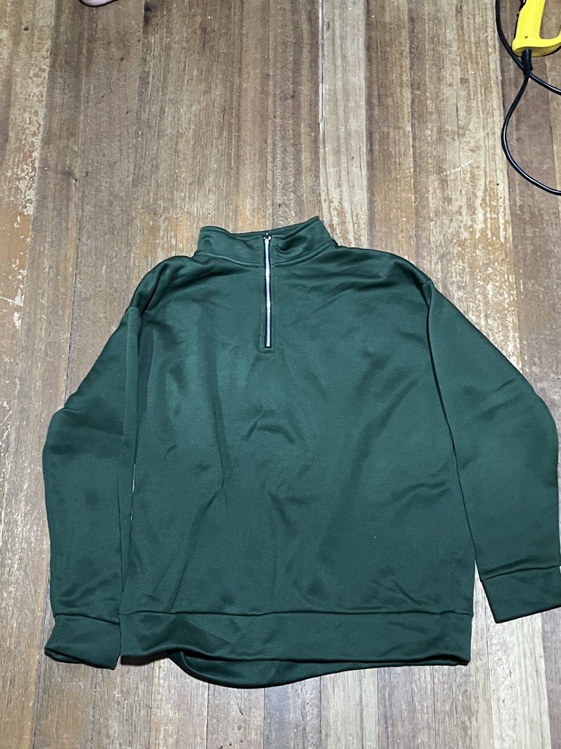 Dark Green Quarter Zip Mock Neck Sweatshirt (Category: Coats, Jackets and Outerwear) located in Manila. Submitted by synezdy (Listing ID 1470023277, Image 1). Description: - Color: Dark green - Design: Quarter-zip closure with mock neck collar - Style: Long sleeves with ribbed cuffs and hem, solid pattern - RFS: Decluttering Slightly negotiable.