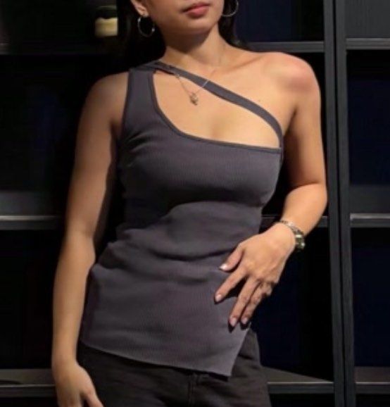 Dark Grey Asymmetrical One Shoulder Ribbed Tank Top (Category: Sleeveless) located in Binan City. Submitted by veniceao (Listing ID 1469958201, Image 3). Description: PLEASE READ ❤️ Loc: Laguna (open for checkout for cheaper sf—starts at ₱20) For sure buyer: 1. Make an offer. 2. Send your details for confirmation 3. Pay until 3pm the next day I confirm the order. Details: - Fits size small-large - Color: Dark Grey - Material: Stretchy ribbed knit