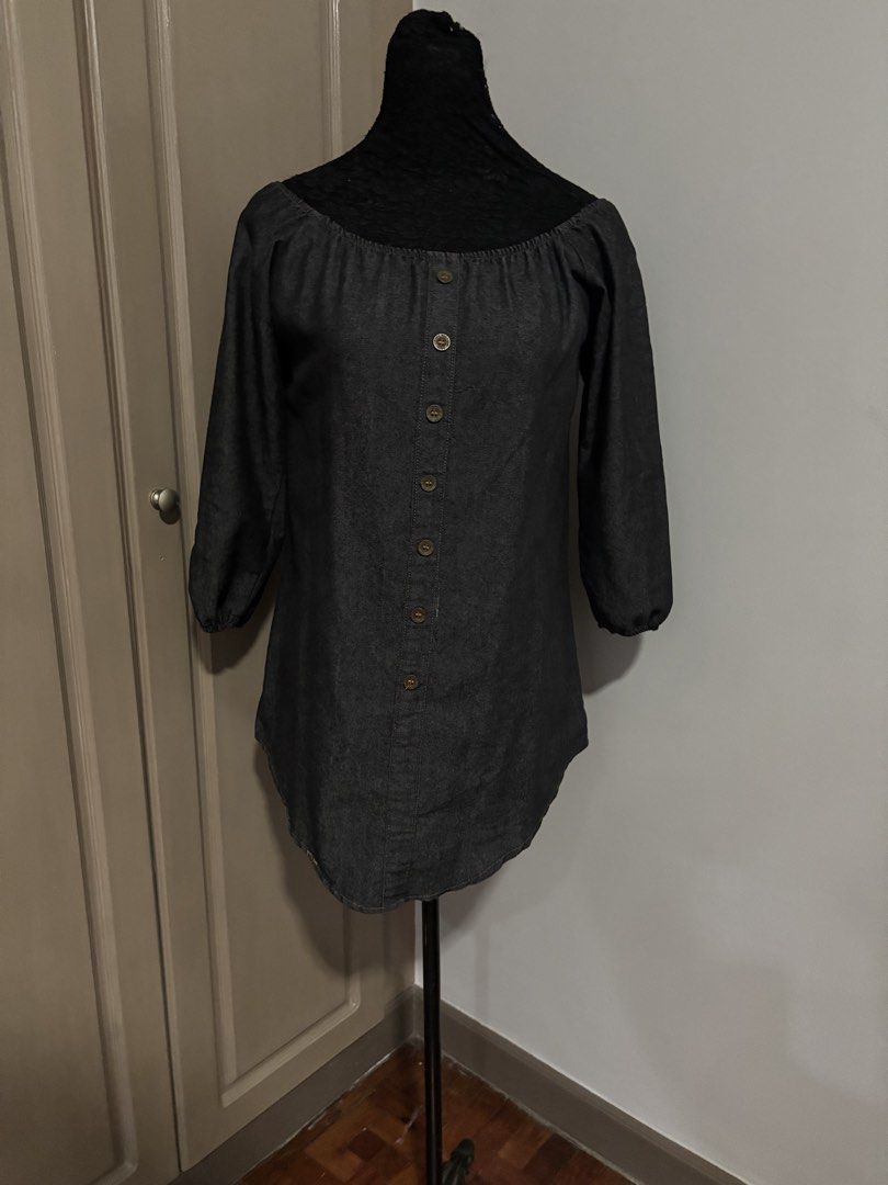 Dark Grey Denim Off-Shoulder Dress (Category: Blouses) located in Quezon City. Submitted by ada_412 (Listing ID 1470128697, Image 1). Description: - Color & Material: Dark grey, soft and lightweight chambray denim - Neckline: Trendy off-shoulder design with functional front buttons - Sleeves: Three-quarter length with comfortable gathered elastic cuffs - Details: Stylish gathered pleats along the back yoke.