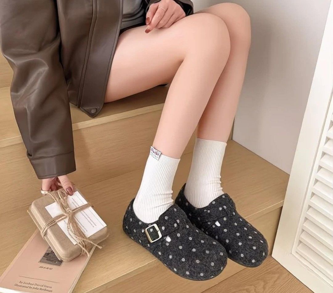 Dark Grey Polka Dot Felt Clogs with Buckle (Category: Slippers and slides) located in Makati City. Submitted by meghantherobot (Listing ID 1470112293, Image 1). Description: - Color & Pattern: Dark grey with white polka dots - Design: Slip-on with a cute decorative side buckle - Toe Shape: Comfortable round toe - Sole: Flat and comfortable for all-day wear - Styling: Looks great with bare feet or paired with white socks - Best For: Casual outings