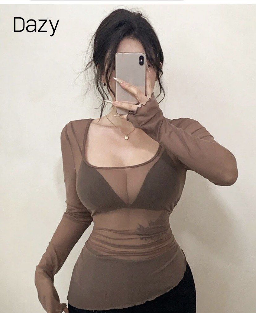 Dazy Brown Mesh Long Sleeve Top (Category: Longsleeves) located in Las Pinas. Submitted by sxo.seya (Listing ID 1469974672, Image 1). Description: - Brand: Dazy - Size: S (tag attached) - Color: Brown - Material: Lightweight, sheer stretch fabric - Design: Scoop neckline, ruched sides, exposed stitching details.