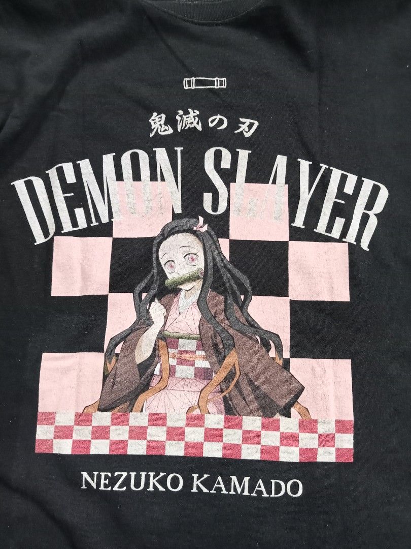 Demon Slayer Tee OPT (Category: Tshirts & Polo Shirts ) located in Cabadbaran. Submitted by reizen_ace051823 (Listing ID 1470024911, Image 2). Description: - condition 9.5/10 - no issue need wash only - size xl on tag - dimes L29 x W21.5.